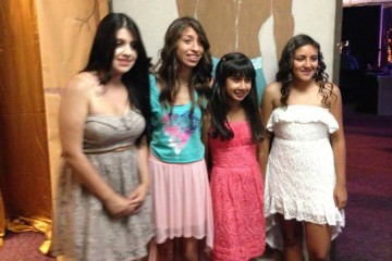 Four teen girls dressed up for the Oncology Prom