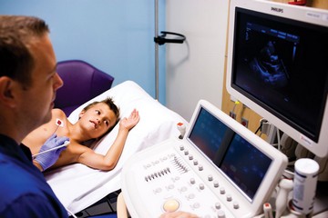 Technician monitoring patient's heart