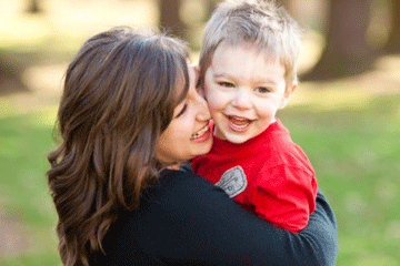 Mom and Toddler Boy Laughing