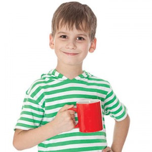 Young boy holding a cup of coffee