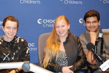 Three teens in Seacrest Studio fro podcast