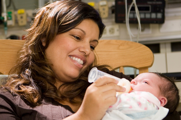 Mom feeding her baby