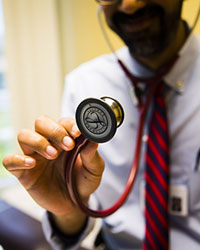 doctor holding stethoscope