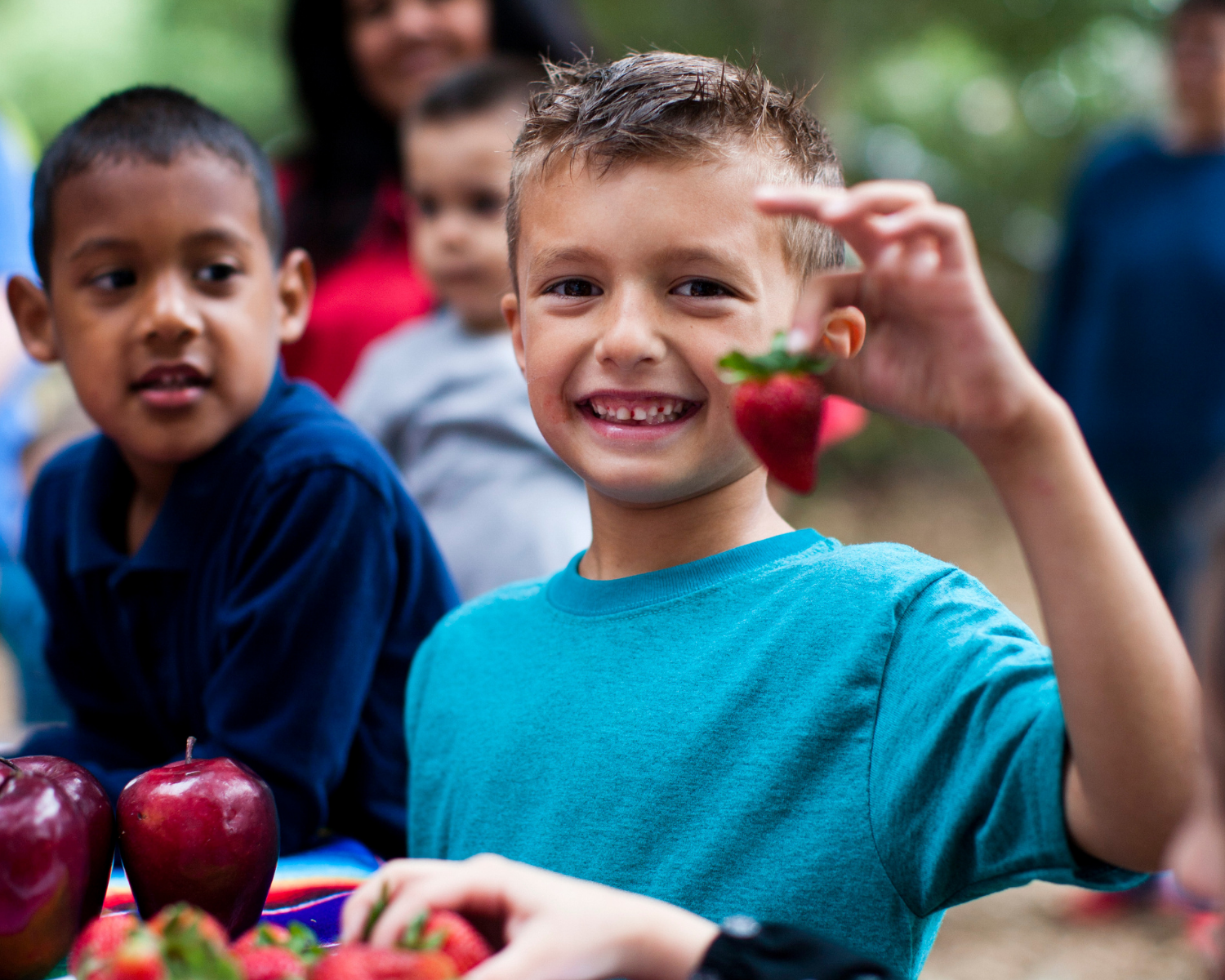 child boy eating strawberry pediatric ulcerative colitis