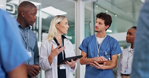 Medical staff talk to each other