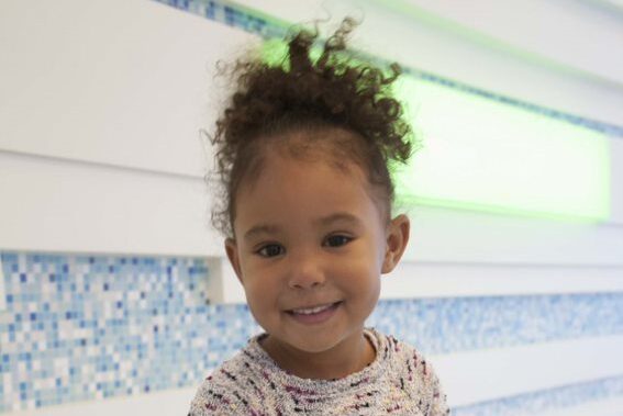 little girl smiling