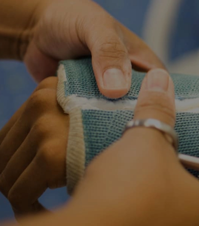 Teen having cast cut off from wrist