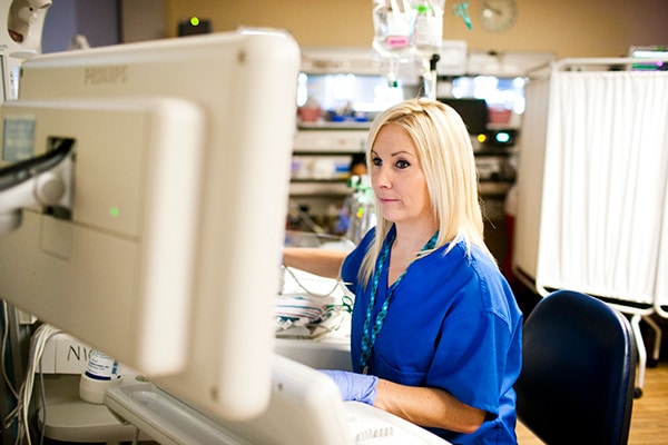 Nurse working at computer