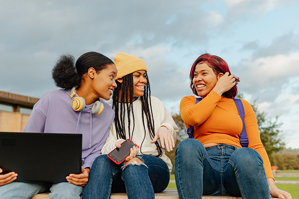 Three teens talking