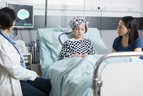 Child in hospital with brain monitoring