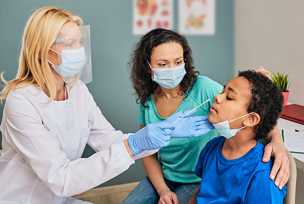 Child receiving covid test
