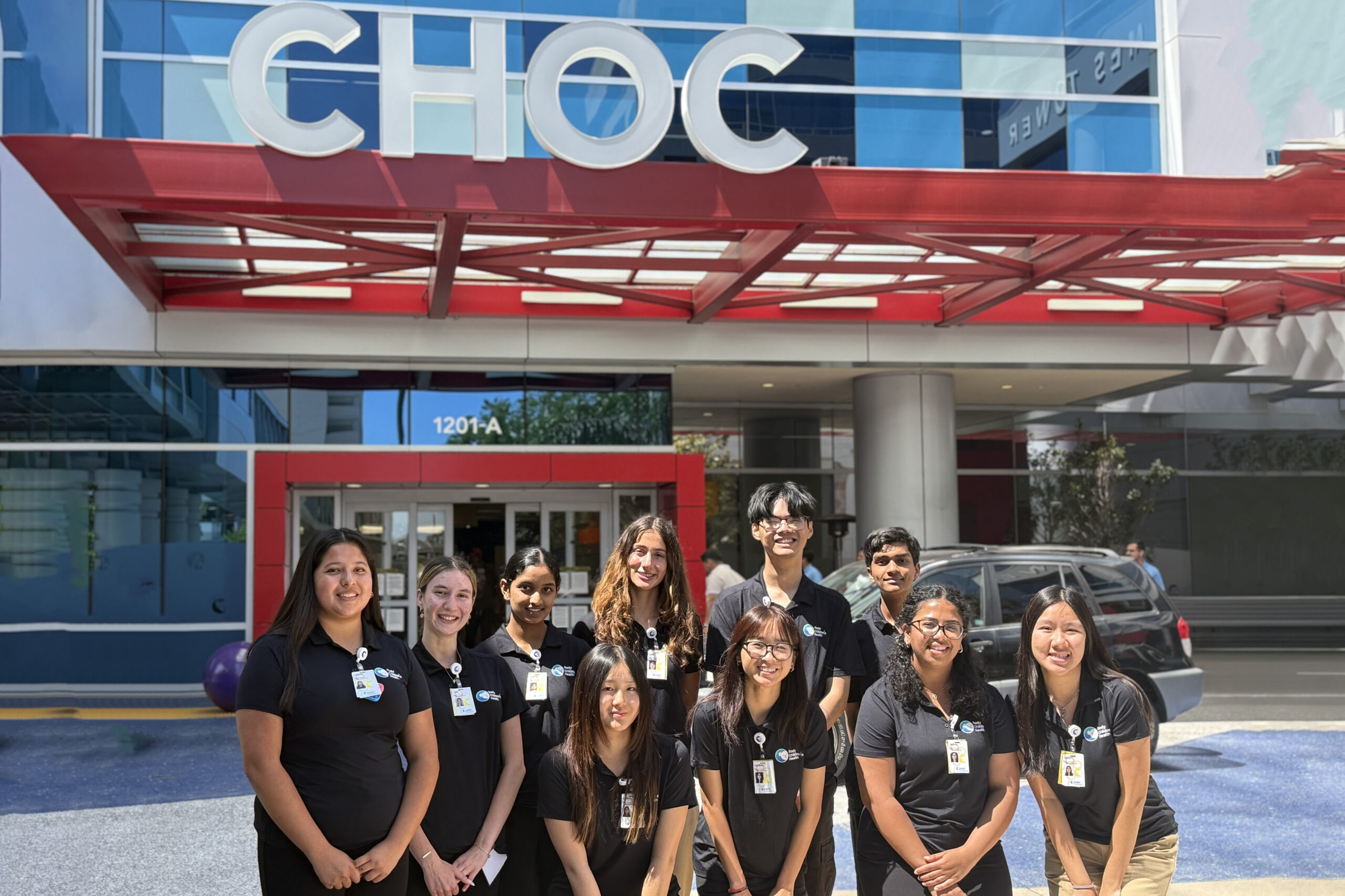 Healthcare Career Academy students smile in front of choc