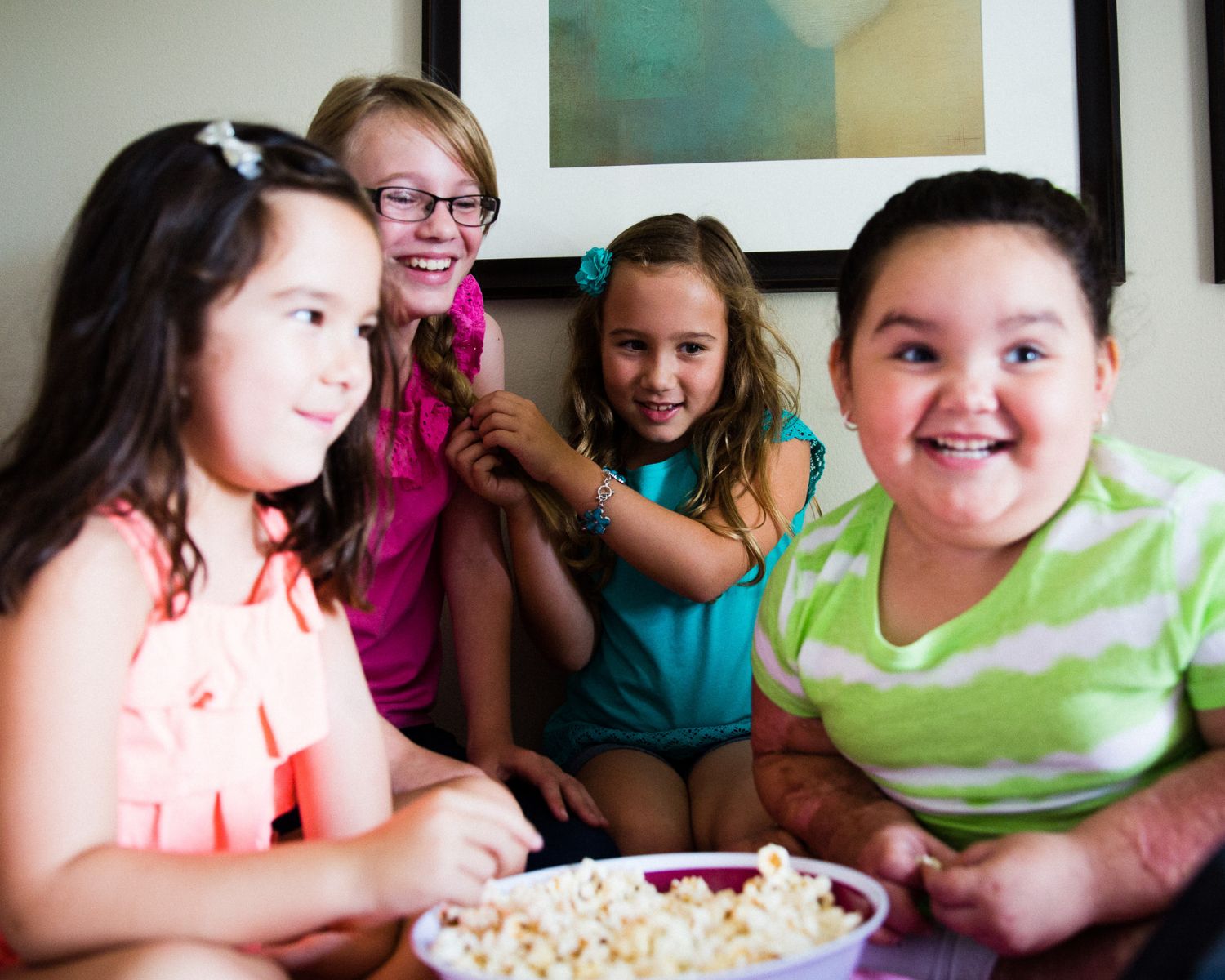 girls enjoying popcorn together